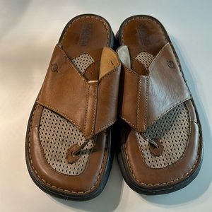 Lightly worn men’s born leather flip flops